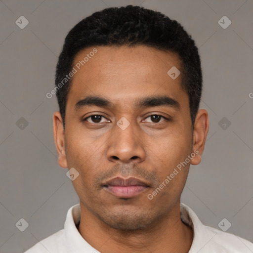 Neutral latino young-adult male with short  black hair and brown eyes