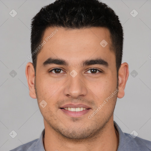 Joyful white young-adult male with short  brown hair and brown eyes