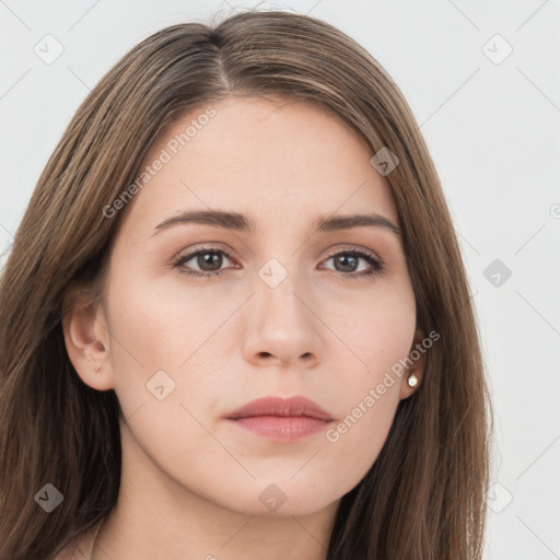 Neutral white young-adult female with long  brown hair and brown eyes