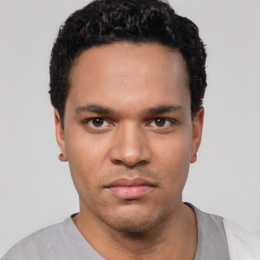 Neutral white young-adult male with short  black hair and brown eyes