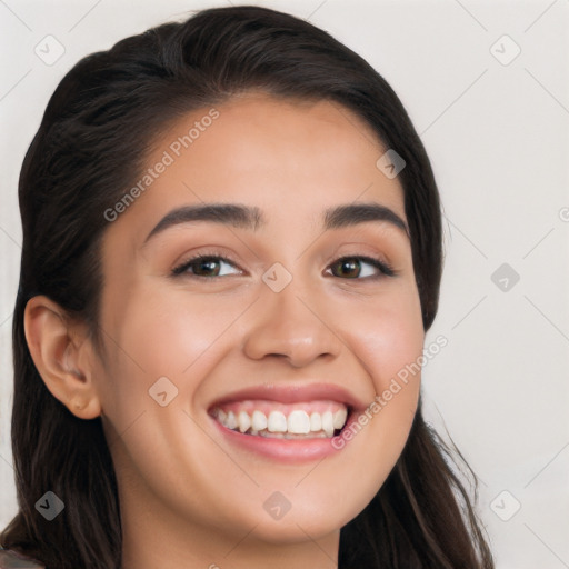 Joyful white young-adult female with long  brown hair and brown eyes