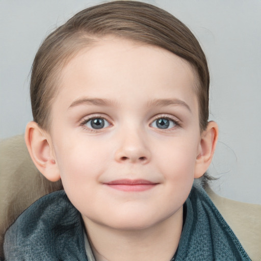 Joyful white child female with medium  brown hair and blue eyes