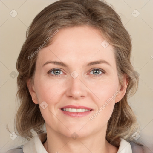 Joyful white young-adult female with medium  brown hair and blue eyes