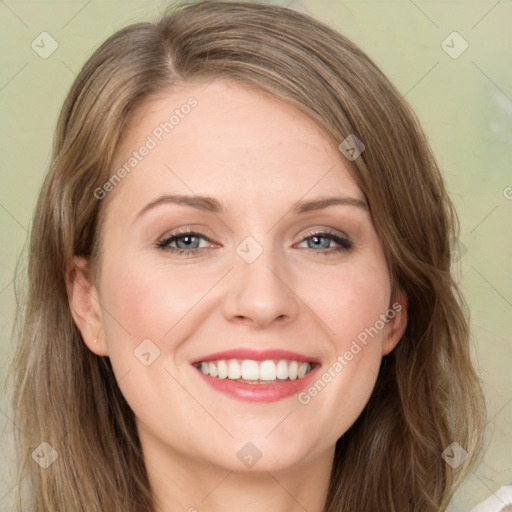 Joyful white young-adult female with long  brown hair and green eyes