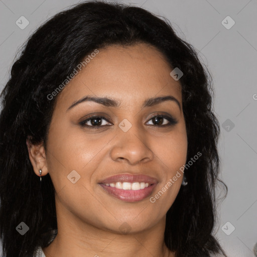 Joyful latino young-adult female with long  brown hair and brown eyes