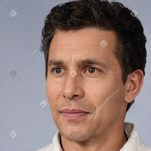 Neutral white adult male with short  brown hair and brown eyes