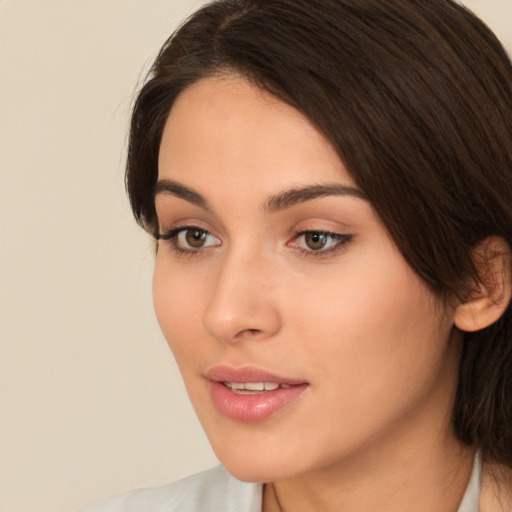 Neutral white young-adult female with medium  brown hair and brown eyes