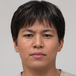 Neutral asian young-adult male with short  brown hair and brown eyes