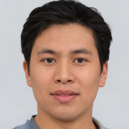 Neutral asian young-adult male with short  brown hair and brown eyes