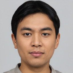 Neutral asian young-adult male with short  black hair and brown eyes