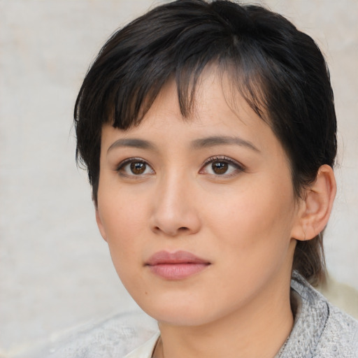 Neutral asian young-adult female with medium  black hair and brown eyes