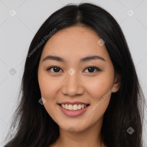 Joyful asian young-adult female with long  brown hair and brown eyes