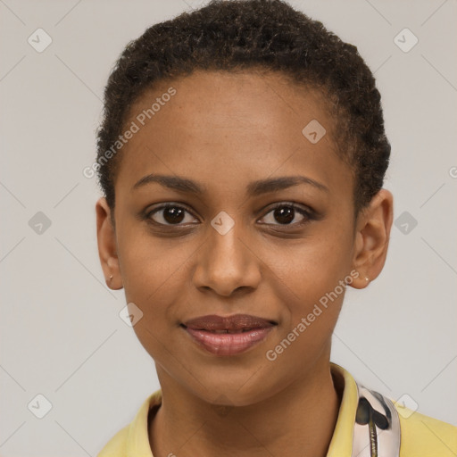 Joyful black young-adult female with short  brown hair and brown eyes