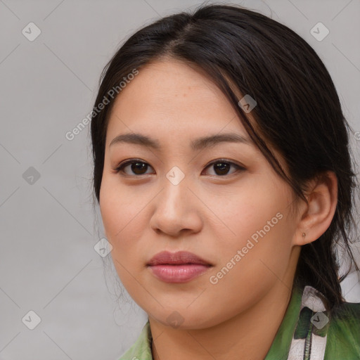 Joyful asian young-adult female with medium  brown hair and brown eyes