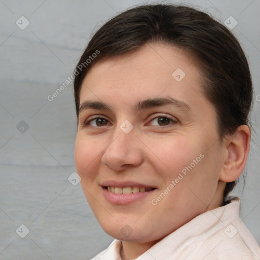 Joyful white young-adult female with short  brown hair and brown eyes