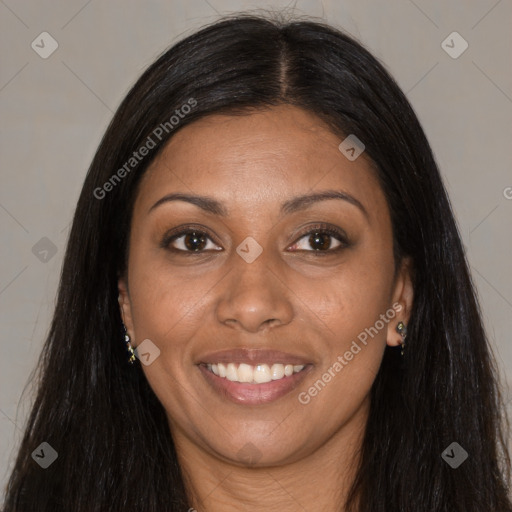 Joyful black young-adult female with long  brown hair and brown eyes