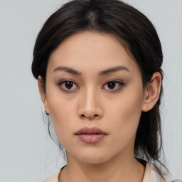 Neutral asian young-adult female with medium  black hair and brown eyes