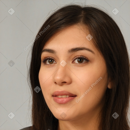 Neutral white young-adult female with long  brown hair and brown eyes