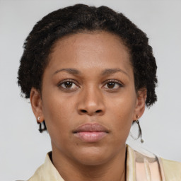 Neutral black young-adult female with short  brown hair and brown eyes