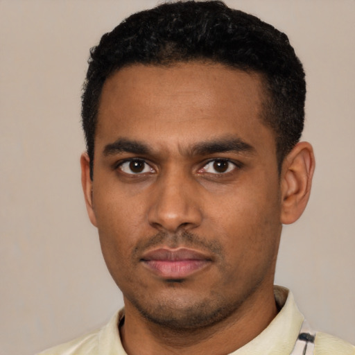 Neutral latino young-adult male with short  black hair and brown eyes