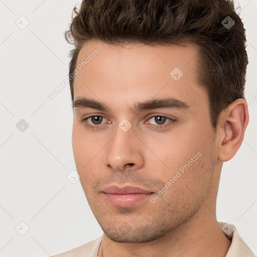 Neutral white young-adult male with short  brown hair and brown eyes