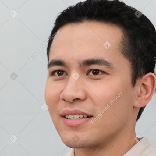 Joyful white young-adult male with short  black hair and brown eyes