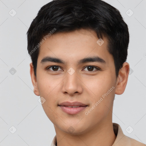 Joyful asian young-adult male with short  black hair and brown eyes