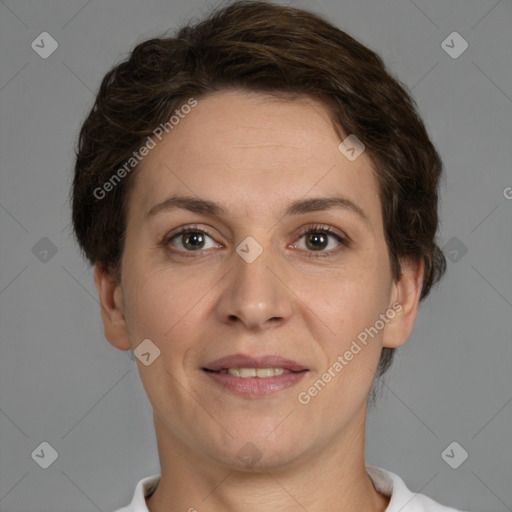 Joyful white adult female with short  brown hair and brown eyes