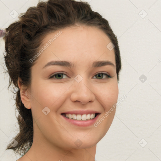 Joyful white young-adult female with long  brown hair and green eyes