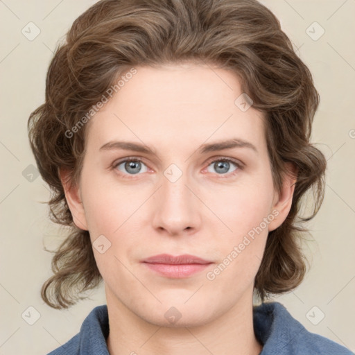 Joyful white young-adult female with medium  brown hair and blue eyes