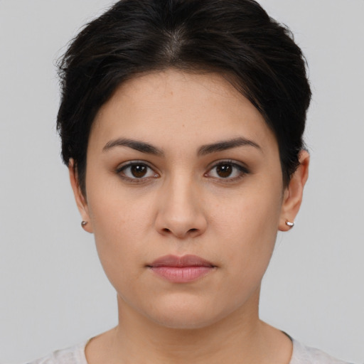 Neutral white young-adult female with short  brown hair and brown eyes