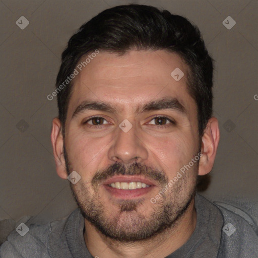 Joyful white adult male with short  brown hair and brown eyes