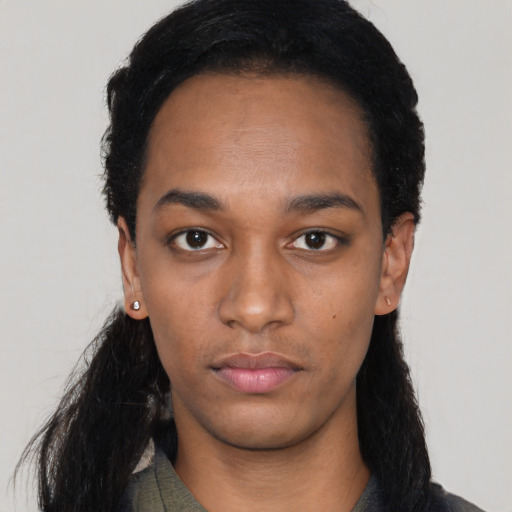 Neutral black young-adult female with long  black hair and brown eyes