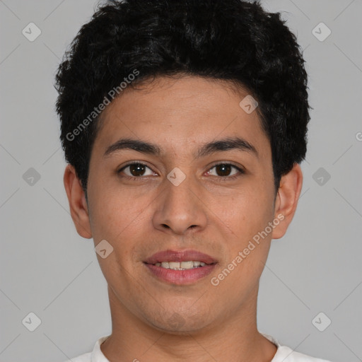 Joyful white young-adult male with short  black hair and brown eyes