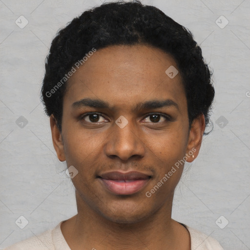 Joyful black young-adult male with short  black hair and brown eyes