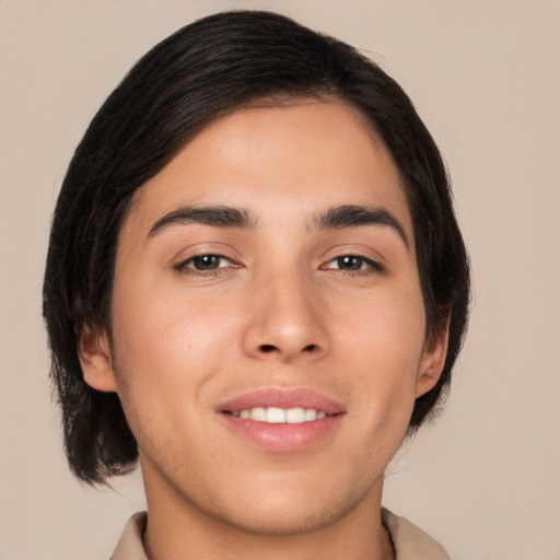 Joyful asian young-adult male with medium  brown hair and brown eyes