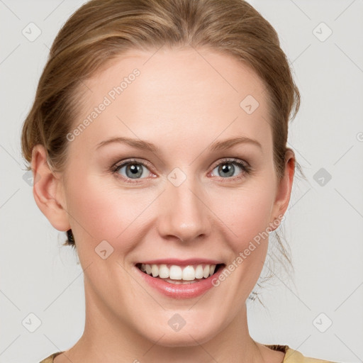 Joyful white young-adult female with medium  brown hair and blue eyes