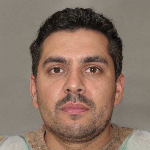 Neutral white adult male with short  brown hair and brown eyes