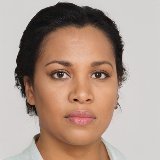 Neutral latino young-adult female with short  brown hair and brown eyes