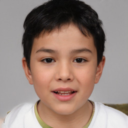 Joyful white child male with short  brown hair and brown eyes