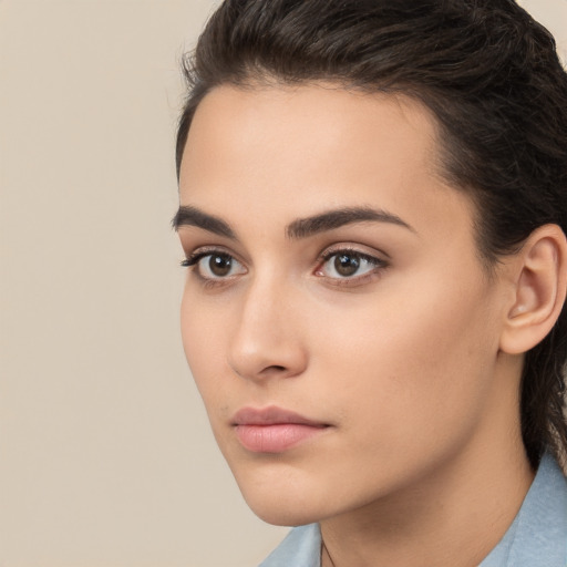 Neutral white young-adult female with medium  brown hair and brown eyes