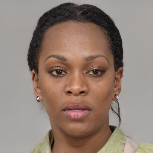 Neutral black adult female with short  black hair and brown eyes
