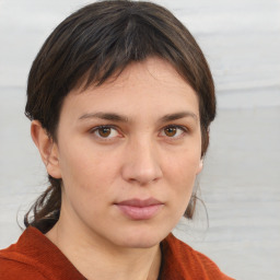 Neutral white young-adult female with short  brown hair and brown eyes