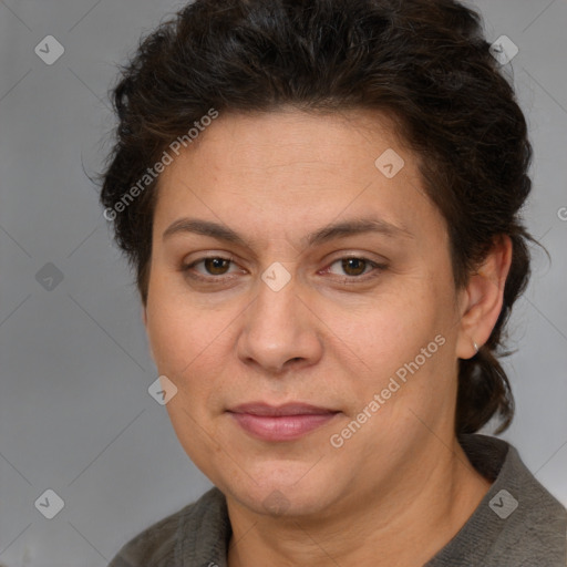 Joyful white adult female with short  brown hair and brown eyes