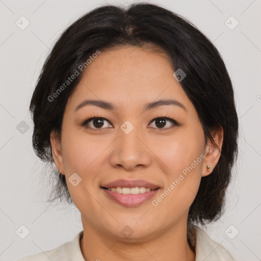 Joyful latino young-adult female with medium  brown hair and brown eyes