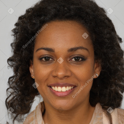 Joyful black young-adult female with medium  brown hair and brown eyes