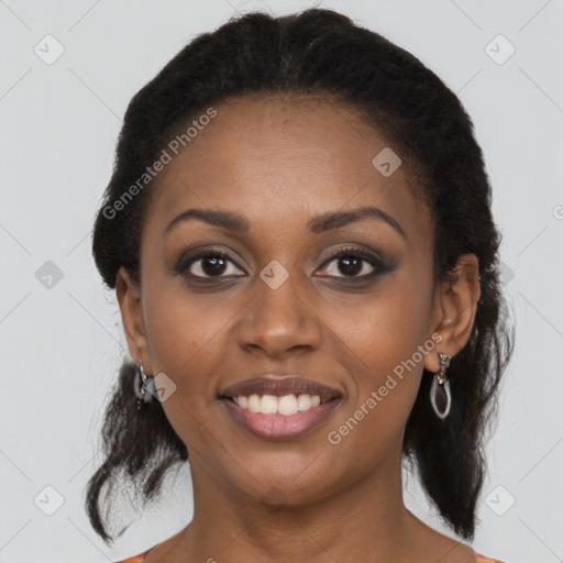 Joyful black young-adult female with medium  brown hair and brown eyes