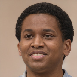 Joyful latino young-adult male with short  brown hair and brown eyes