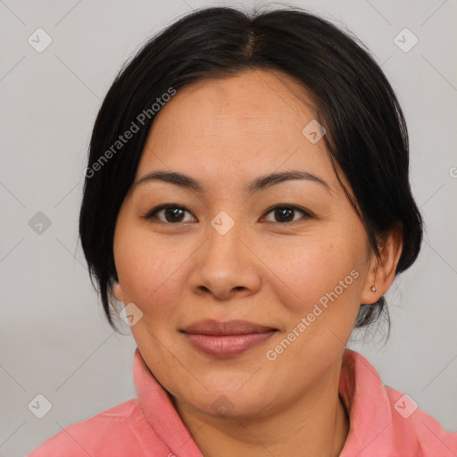 Joyful asian young-adult female with medium  black hair and brown eyes