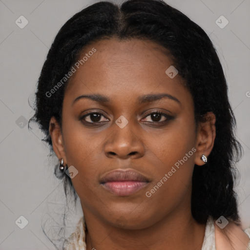 Joyful black young-adult female with medium  black hair and brown eyes